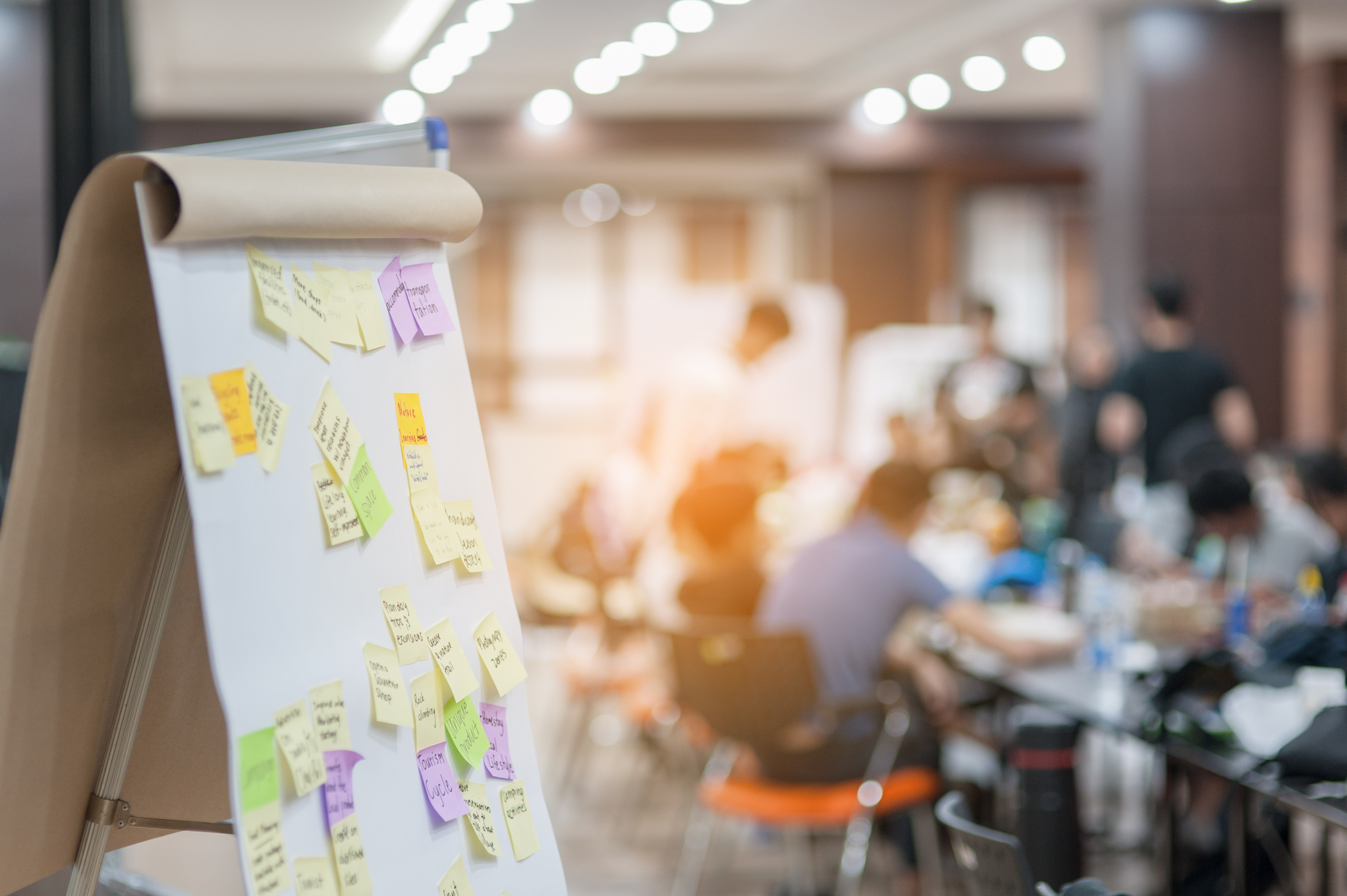 Business people meeting at office and use post it notes to share